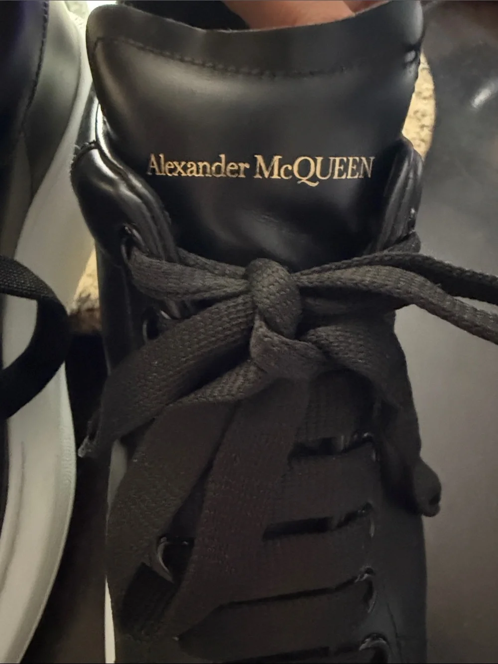 Alexander McQueen Women’s Oversized Black Leather Sneakers with White Platform